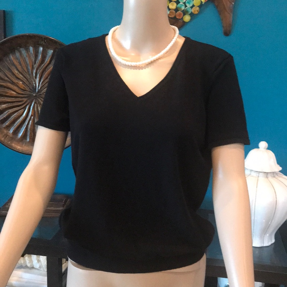 Size L black top. Like new!